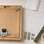Installation porte lave vaisselle encastrable : glissières ou fixation directe